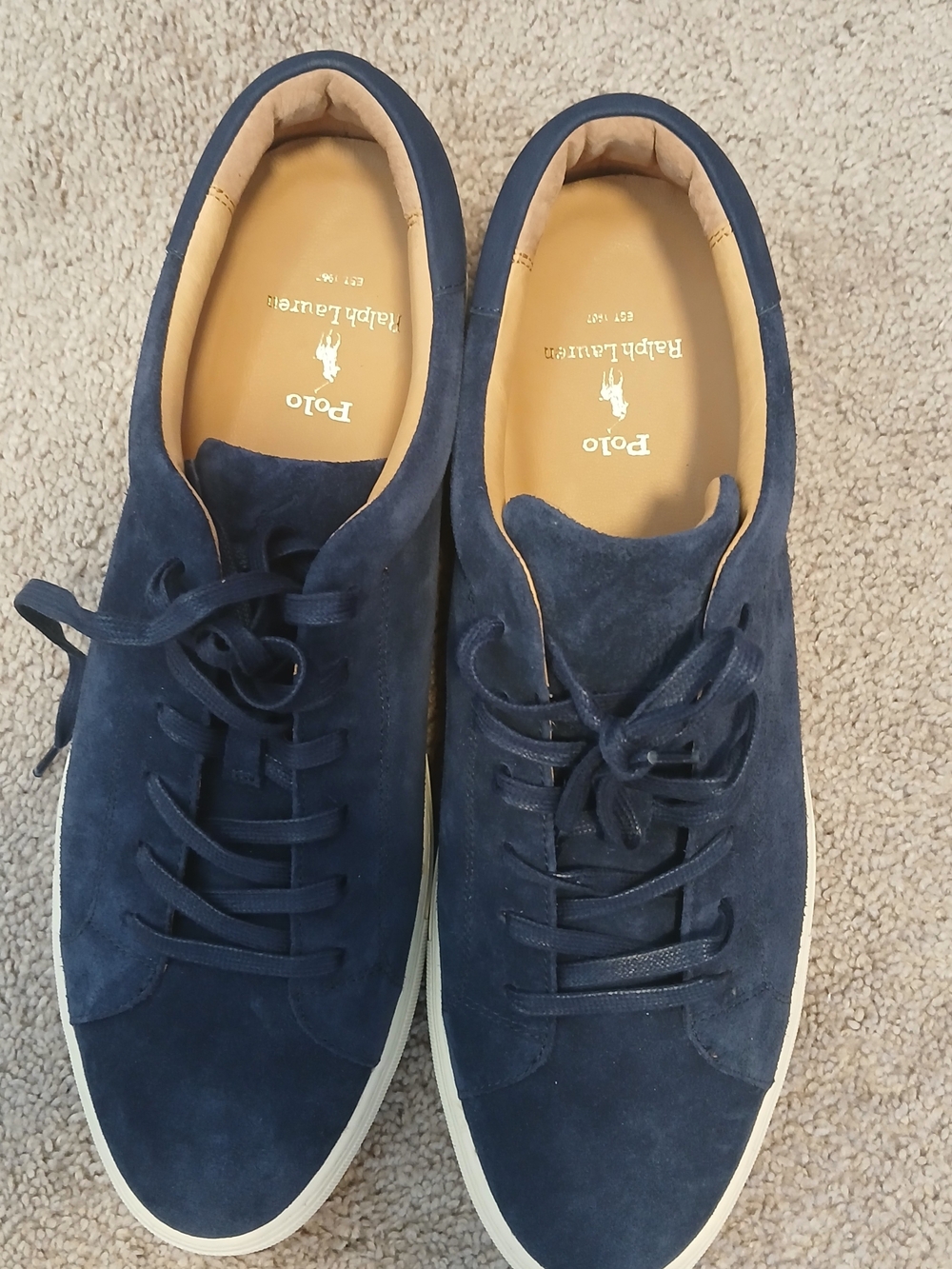 Polo Ralph Lauren Jermain sneakers feature a streamlined silhouette in navy blue